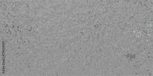 Close-up macro view of a textured gray surface resembling concrete or stone with a granular, speckled appearance and subtle variations in light and shadow, perfect for industrial or architectural