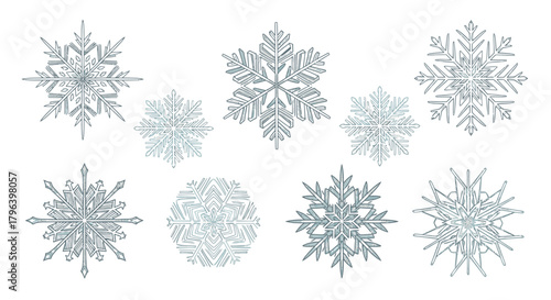 A collection of nine intricate, decorative silver snowflakes with glitter texture isolated on a white background.