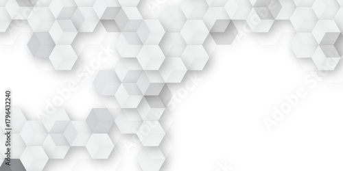 A subtle hexagon pattern background with interconnected shapes in soft gray and white. Simple abstract modern background White geometric hexagonal honeycomb shape texture background 3d copy space.	