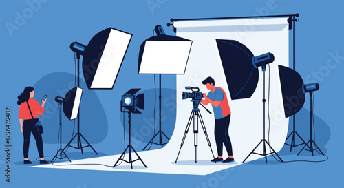 Professional photographers setting up a modern studio with various lighting equipment and a video camera on a tripod for a photoshoot.
