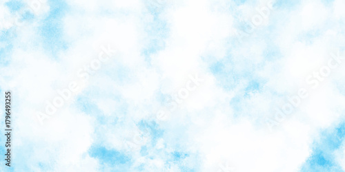 A soft ethereal background of pale blue and white clouds creates a tranquil and dreamlike atmospheric scene