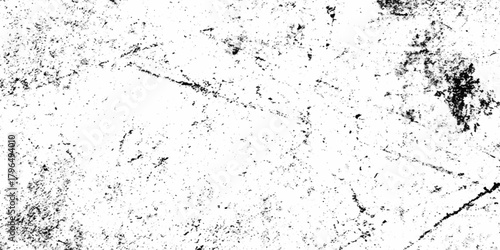 A highly contrasted grainy texture resembling weathered stone or distressed paper fills the frame creating an abstract visual pattern