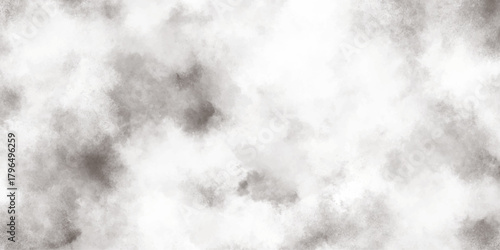 A wispy and ethereal cloudscape fills the frame showcasing subtle shades of gray and white creating a soft dreamlike atmosphere