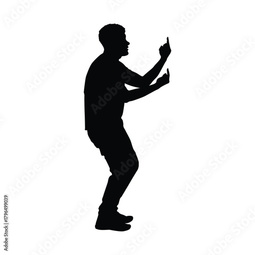 Silhouette of a man showing his middle fingers. A depiction of insult, anger and bad attitude.