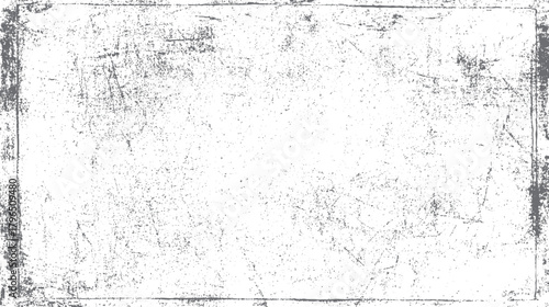 Distressed grey and white textured background with grunge scratches and speckles forming a border and scattered marks