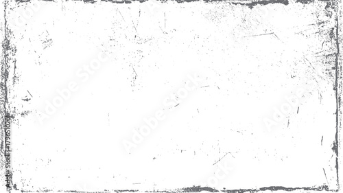 Faded grey distressed grunge texture with scratches and speckles on white background scratched