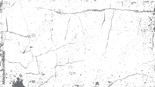 White concrete wall with dark grey cracks and speckles creating a distressed textured background grunge