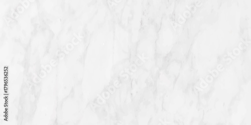 A close up view of a white marble texture showcasing subtle veining and a smooth polished surface