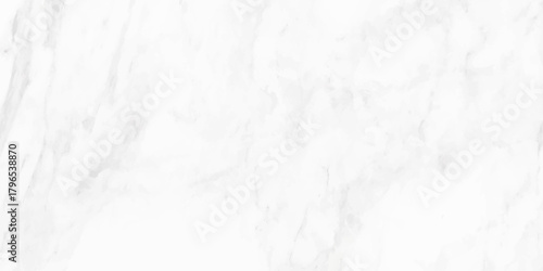 A close up view of a white marble surface displaying subtle veining and a polished texture creating an elegant backdrop