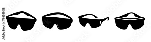 Four pairs of black safety goggles showing different angles and styles for eye protection
