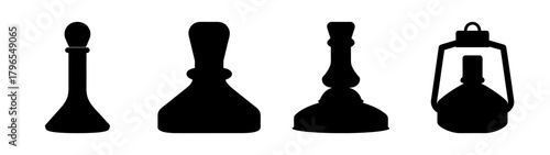 Silhouettes of four vintage laboratory burners and an oil lamp