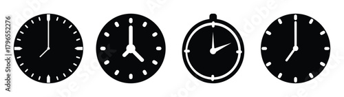 Collection of classic analog clocks displaying different times