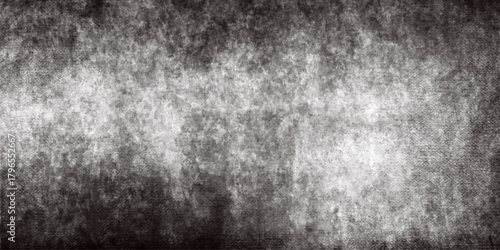 a grainy monochromatic abstract texture displays a soft blurred and indistinct pattern with subtle variations in tone and light