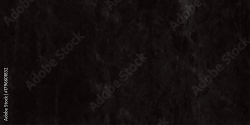 A blurry dark image featuring indistinct vertical streaks resembling rain or a heavily shadowed texture