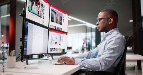 Young Black Journalist Writing Online News Article