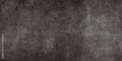 A dark textured background with a grainy mottled appearance suggesting a distressed or weathered surface