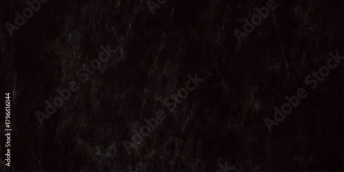A completely black image with subtle texture suggesting darkness shadow and a lack of visible detail or content