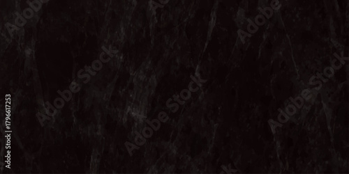 A predominantly black image displaying a textured abstract pattern resembling falling rain or snow droplets