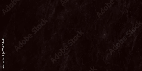 A dark nearly black textured background suggesting dense flowing strands or fibers filling the frame