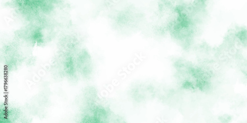 Abstract mint green watercolor texture background with soft cloudy and turquoise tones blended into cloudy, diffused splashes.	