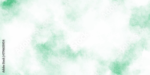 Abstract mint green watercolor texture background with soft cloudy and turquoise tones blended into cloudy, diffused splashes.	