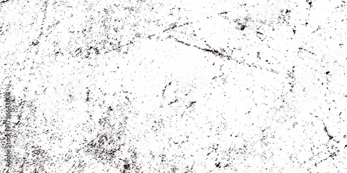 Rough grainy grunge texture featuring distressed speckles and various black particles are surrounding the white background, faded details, and raw vintage surface perfect for edgy design projects.