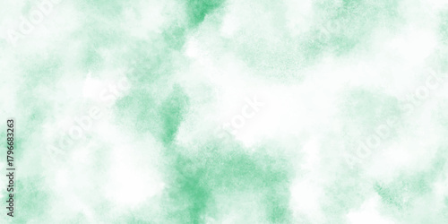 Abstract mint green watercolor texture background with soft cloudy and turquoise tones blended into cloudy, diffused splashes.