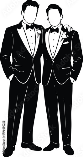 Two men in black tuxedos with bow ties and boutonnieres standing together formal wear suit