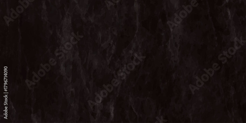 High resolution texture of a very dark nearly black slate or marble stone surface It features subtle veining and a rugged, weathered.