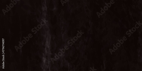 High resolution texture of a very dark nearly black slate or marble stone surface It features subtle veining and a rugged, weathered.