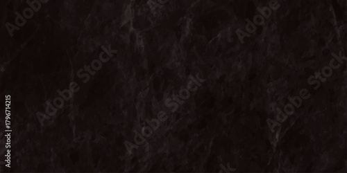High resolution texture of a very dark nearly black slate or marble stone surface It features subtle veining and a rugged, weathered.