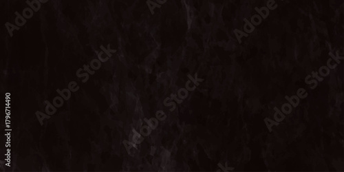 Dark black slate stone background with subtle veins and rough, distressed texture for overlay dramatic backdrop, elegant wall paper.