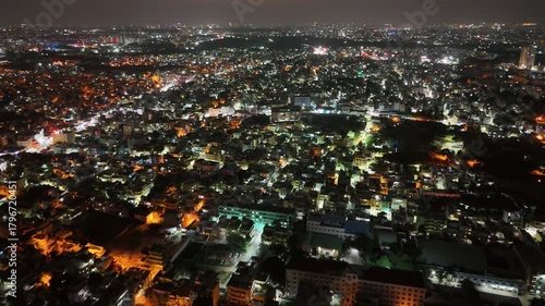 Wallpaper Mural 4K Aerial Night View of Bustling Metropolitan City – Urban Lights, Busy Roads, High-Rise Buildings, Nightlife Atmosphere, and Vibrant Tier-1 Suburban Development Torontodigital.ca
