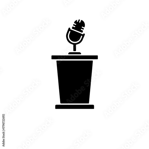 black and white icon featuring a simple podium with a microphone, ready for use. Symbolizes public debate, political campaigning, and the democratic right to express support or criticism openly