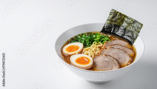Delicious Japanese Ramen Bowl with Chashu Pork SoftBoiled Eggs and Nori on White Background.