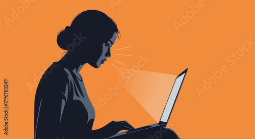 Silhouette of a woman intensely focused on her laptop screen.