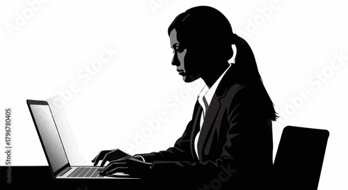 Silhouette of a woman in a suit working on a laptop.