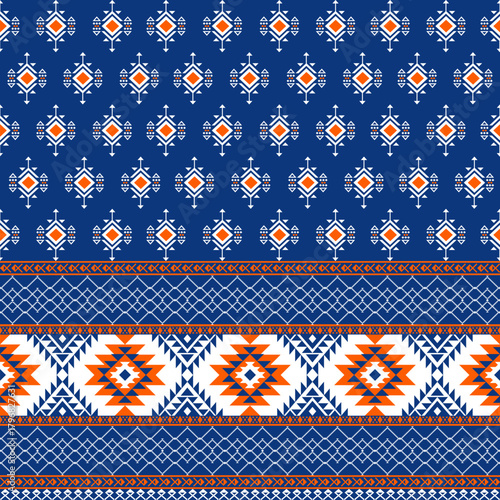 A detailed ethnic textile pattern featuring small geometric motifs arranged across a deep blue background, paired with decorative tribal borders. Ideal for fabrics, apparel, stationery, and home déco