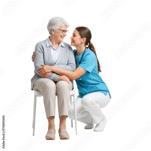 Caregiver Kneeling with Elderly Woman in Chair – Warm, Supportive Moment of Trust and Compassionate Care

