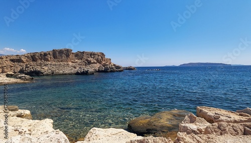Journey to a coastal destination, rocky shoreline of the Mediterranean Sea, erosion risk