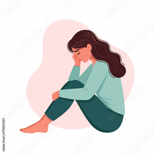 Depressed young woman sitting alone. Mental health, anxiety, sadness, and stress concept.