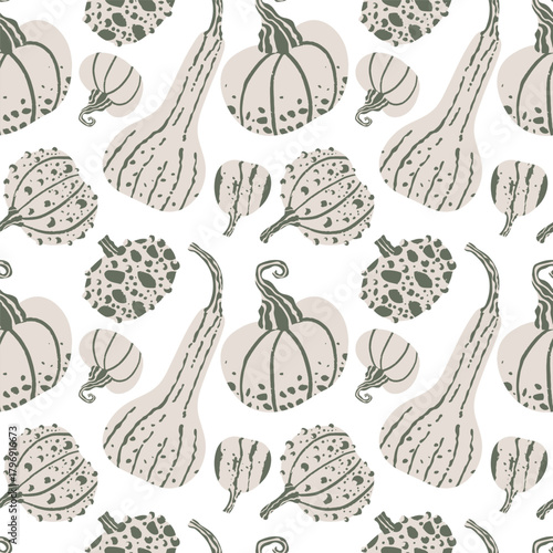 Seamless pattern of squash and pumpkins with a light green background. The vegetables are drawn in a stylized way. Good for for textiles, packaging, backgrounds