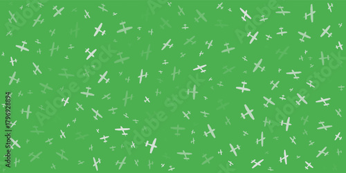 Seamless background pattern of evenly spaced white airplane symbols of different sizes and opacity. Vector illustration on green background with stars