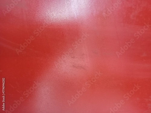 Smooth Vibrant Red Plastic Surface Minimalist Background