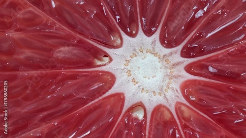 Close up view of a vibrant grapefruit slice