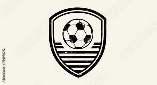 Classic black and white soccer crest featuring a football inside a striped shield emblem on a light background.