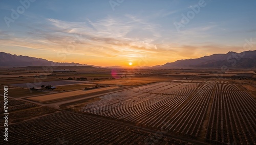 Landscape view of a solar energy facility nestled in a valley, emphasizing renewable energy potential, Earth Day