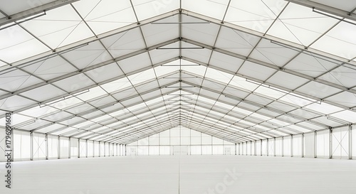 Spacious Event Tent Interior with Steel Frame and White Canvas.