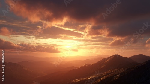 Dramatic sunset over mountain range with vibrant orange and gold clouds