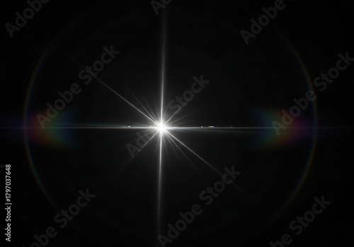 Brilliant starburst lens flare effect radiating bright light and subtle rainbow halo, perfect for adding dramatic flair to any project.